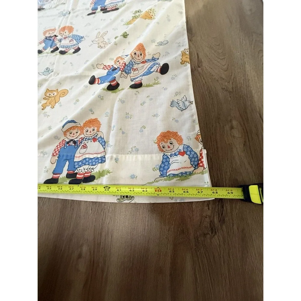 Vintage sheet and pillowcase featuring Raggedy Ann and Andy